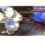 ゼビウスのロゴとソルバルウを描いたサウンド付きトイの箱。ナムコの人気シューティングゲームをモチーフにしている。